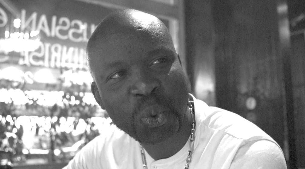 Video-still (Moussa) from The Discourse of the Drinkers by Annika Larsson (2017).