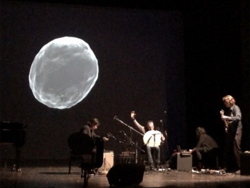 (EI) The Blob, Annika Larsson and Satch Hoyt sonic visions of another possible planet through Sun Ra’s incantation “Its After the End of the World”.Performers: Annika Larsson (Interactive 3D graphics, voice ) Satch Hoyt (voice, percusssion, flute) Felix Gebhard (electric guitar and synthesizer), Ni Fan (percussion). during ENCORES – music on recurrence, redundancy and surplus,Curated by Augustin Maurs, Teatro Goldoni, Venice, Italy, 2019